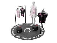 a mannequin wearing pink t - shirts on a stand