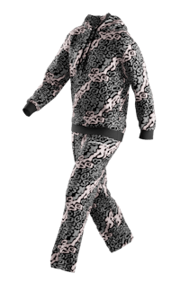 a woman is walking in a leopard print pajama set